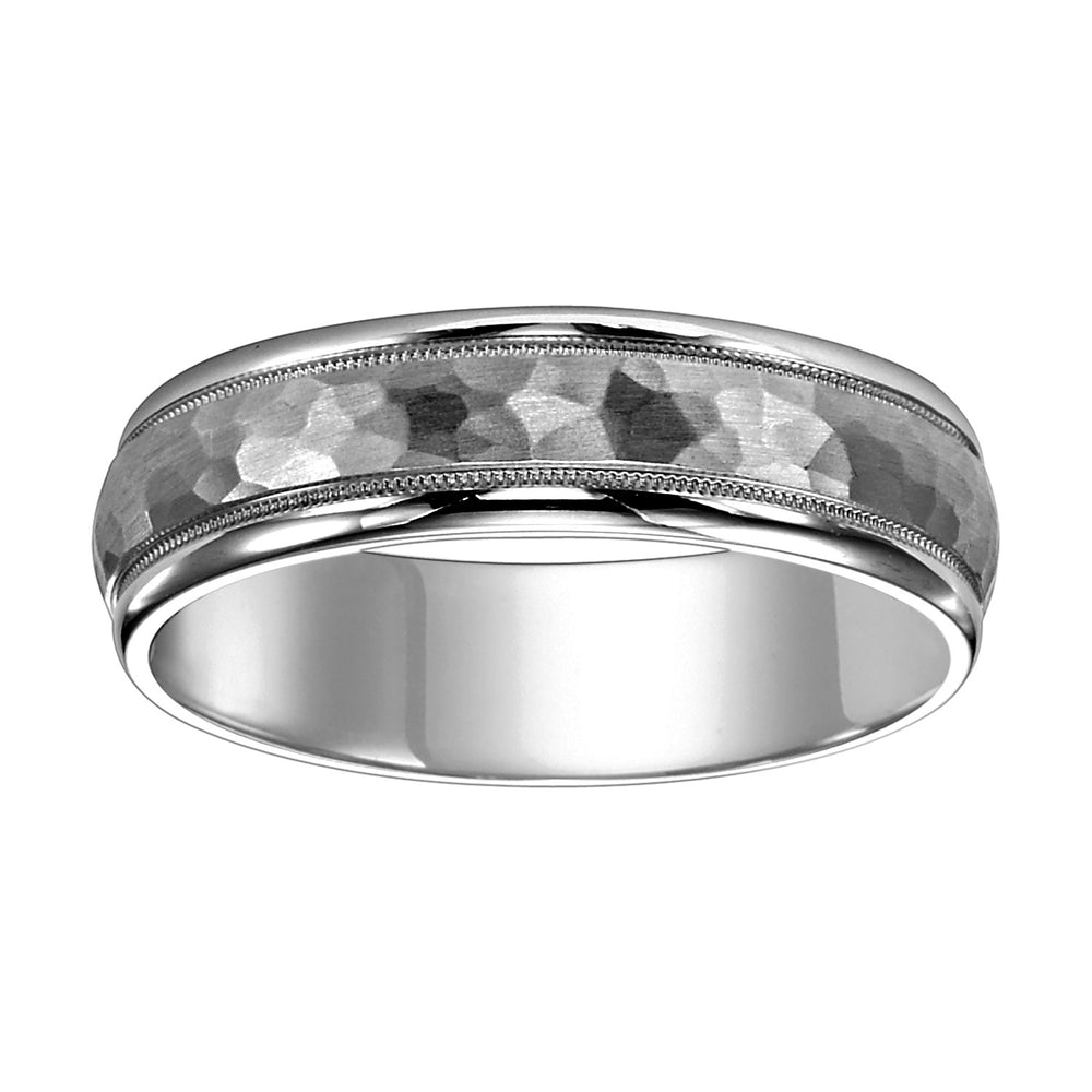 11-6867-G.03 - Goldman - This low domed Comfort Fit wed band features a brushd hammerd finish with milgrn and round edges to complete this luxurious yet classic look Pls note hand hammerd styles will have slight variations due to the nature of the ma