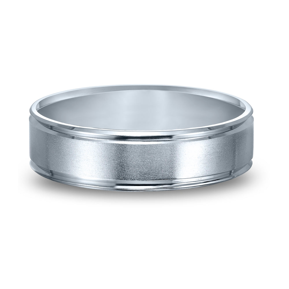 Comfort fit wedding band with brushed finish and beveled edges.