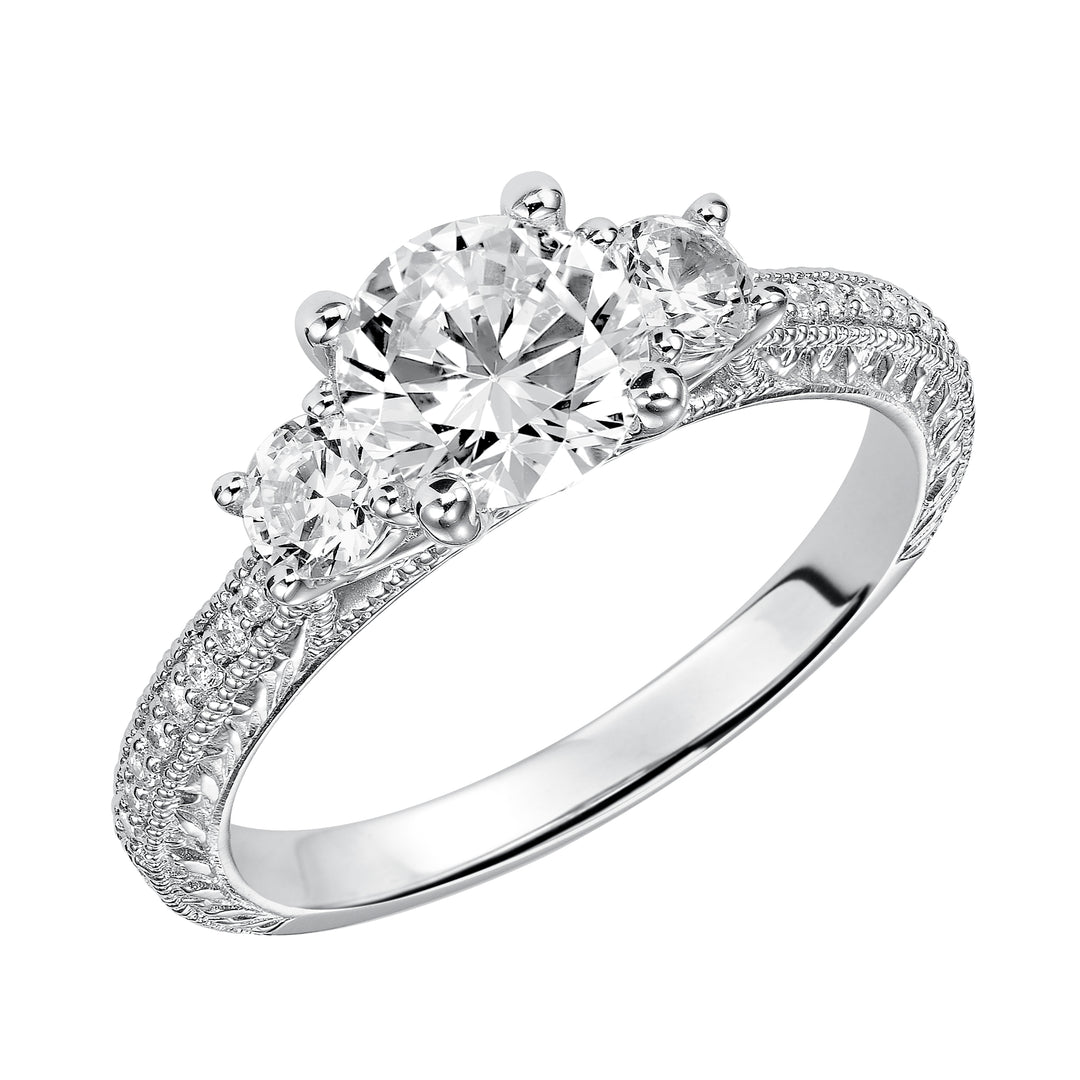 This eye-catching 3-stone engagement sparkles with its diamond prong set band with engraving and milgrain details