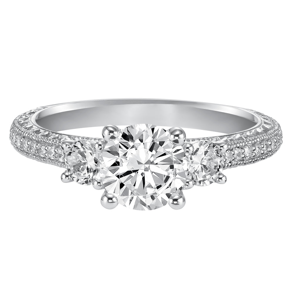 This eye-catching 3-stone engagement sparkles with its diamond prong set band with engraving and milgrain details
