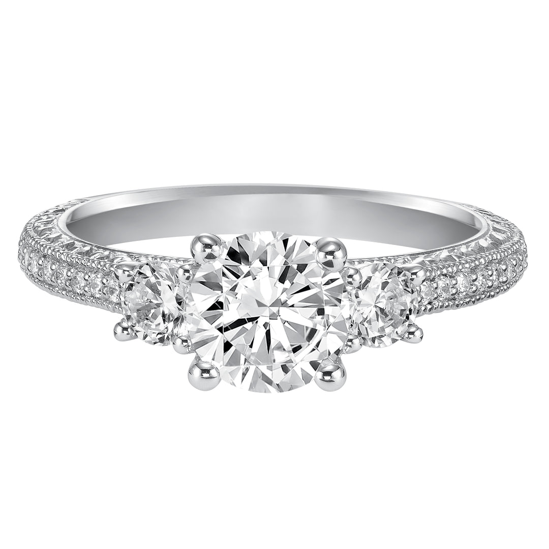 This eye-catching 3-stone engagement sparkles with its diamond prong set band with engraving and milgrain details.  Center Stone is not included.