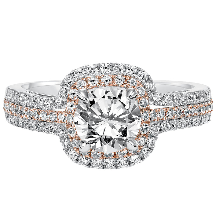 This engagement ring is truly breathtaking featuring both rose and white gold in its prong set diamond double halo and three row band design .  Center Stone is not included.
