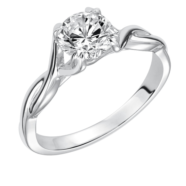 This ribbon-twist inspired high polished band gracefully accentuates the center diamond.  Center Stone is not included.