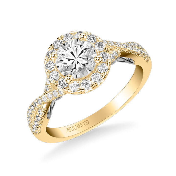 Lyric Engagement Ring with Round Diamond Halo and Carved Gallery details with Twist Diamond Shank.  Center Stone is not included.