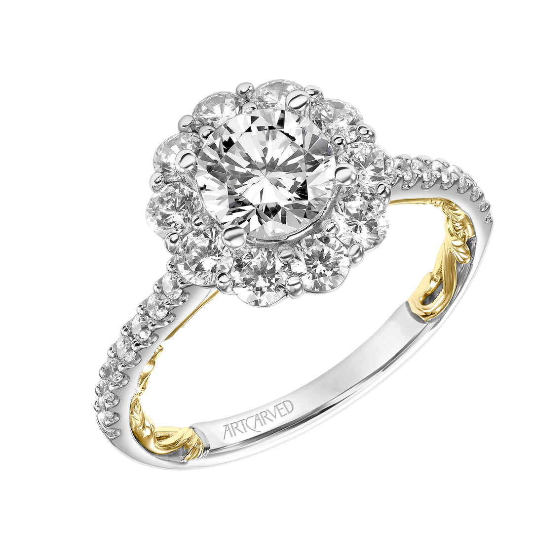 Lyric Engagement Ring with Round Diamond Halo and Accented Diamond Gallery with Inner Carved details and Diamond Shank.  Center Stone is not included.
