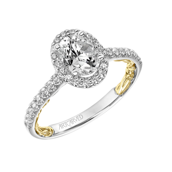 Lyric Engagement Ring with Oval Diamond Halo and Accented Diamond Gallery with Inner Carved details and Diamond Shank.  Center Stone is not included.