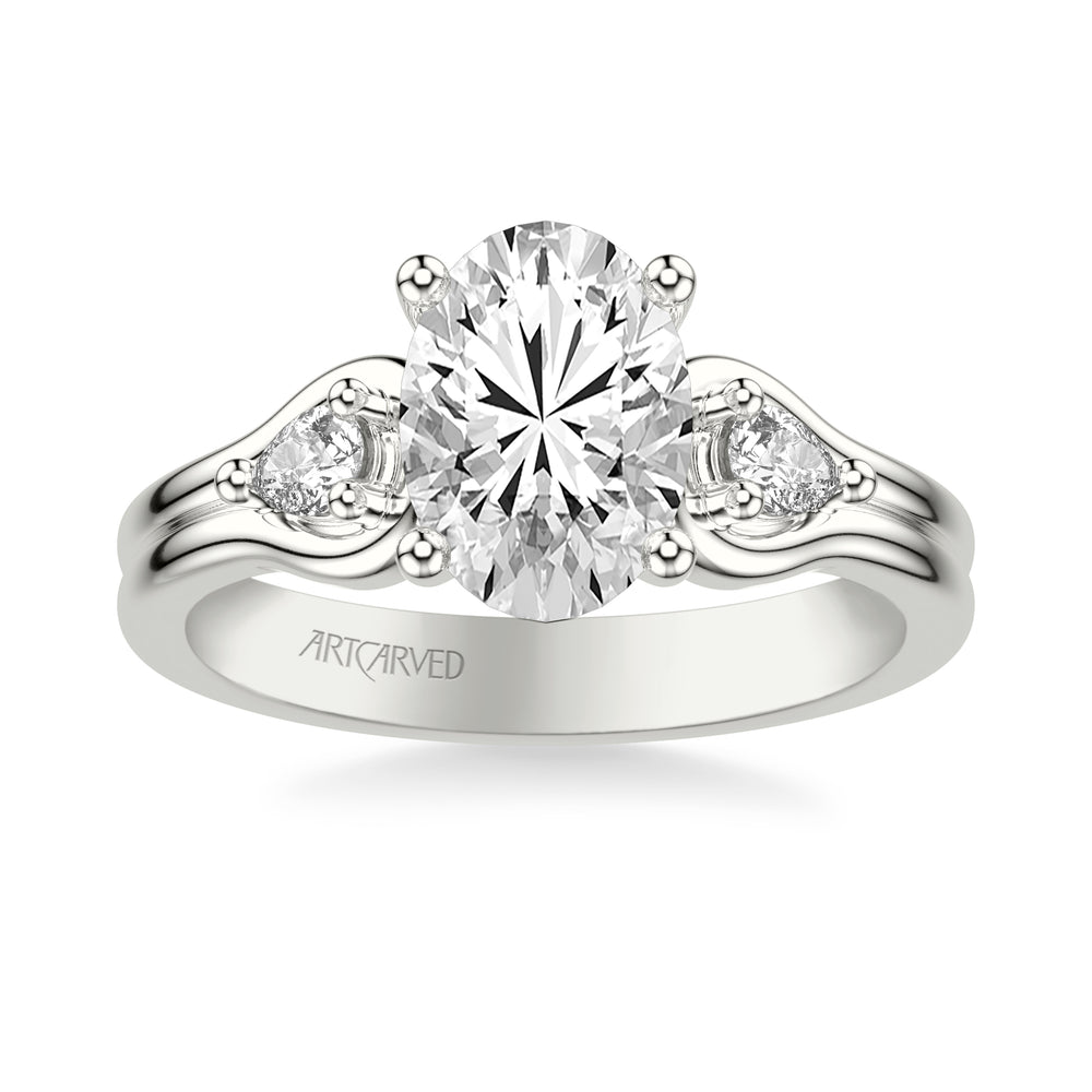 Classic Three-Stone Engagement Ring with Pear Side Stones and Double Row Polished Shank.  Center Stone is not included.
