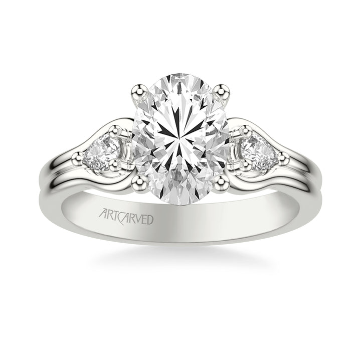 Classic Three-Stone Engagement Ring with Pear Side Stones and Double Row Polished Shank.  Center Stone is not included.