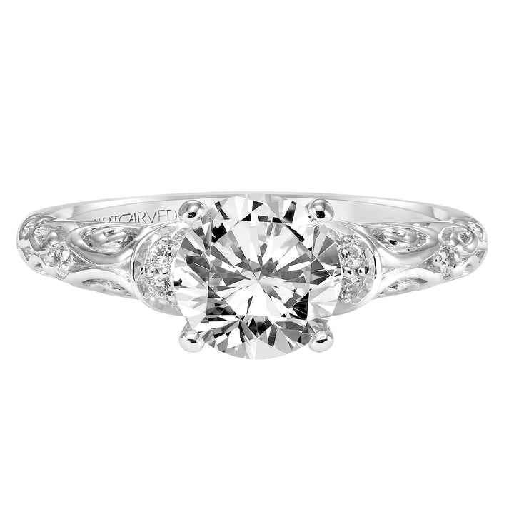 Diamond engagement ring with round center stone and carved diamond enhanced band.  Center Stone is not included.