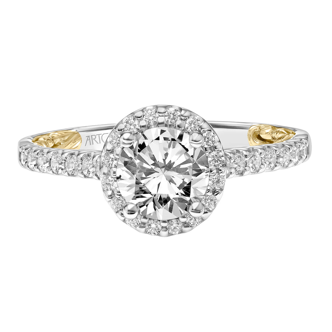 Lyric Engagement Ring with Round Diamond Halo and Accented Diamond Gallery with Inner Carved details and Diamond Shank.  Center Stone is not included.