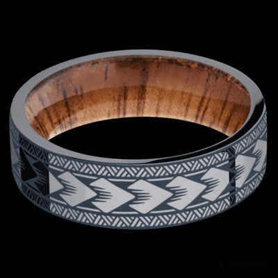 7 mm wide/Flat/Tantalum band with a laser carved Maori pattern also featuring a Koa sleeve.