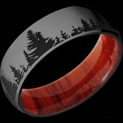 7 mm wide/Domed/Zirconium band with a laser carved Trees pattern also featuring a Padauk sleeve.