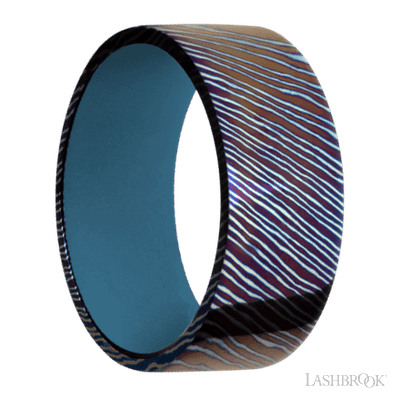9 mm wide Flat Titanium Damascus band featuring a Royal Blue sleeve.